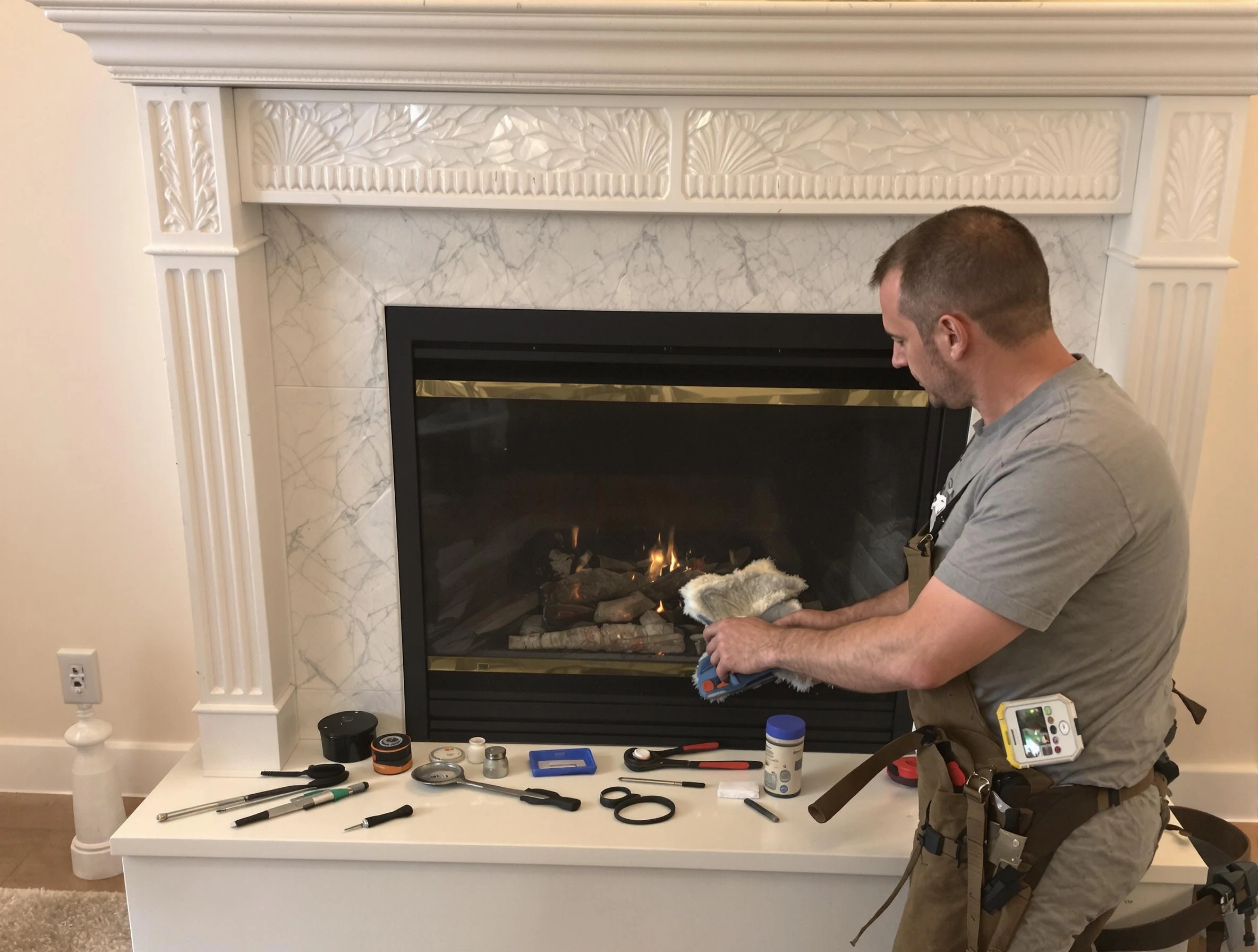 Plymouth Chimney Sweep performing fireplace maintenance in Plymouth, MA